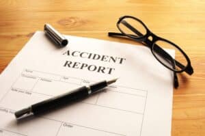 Accident report form or document on table